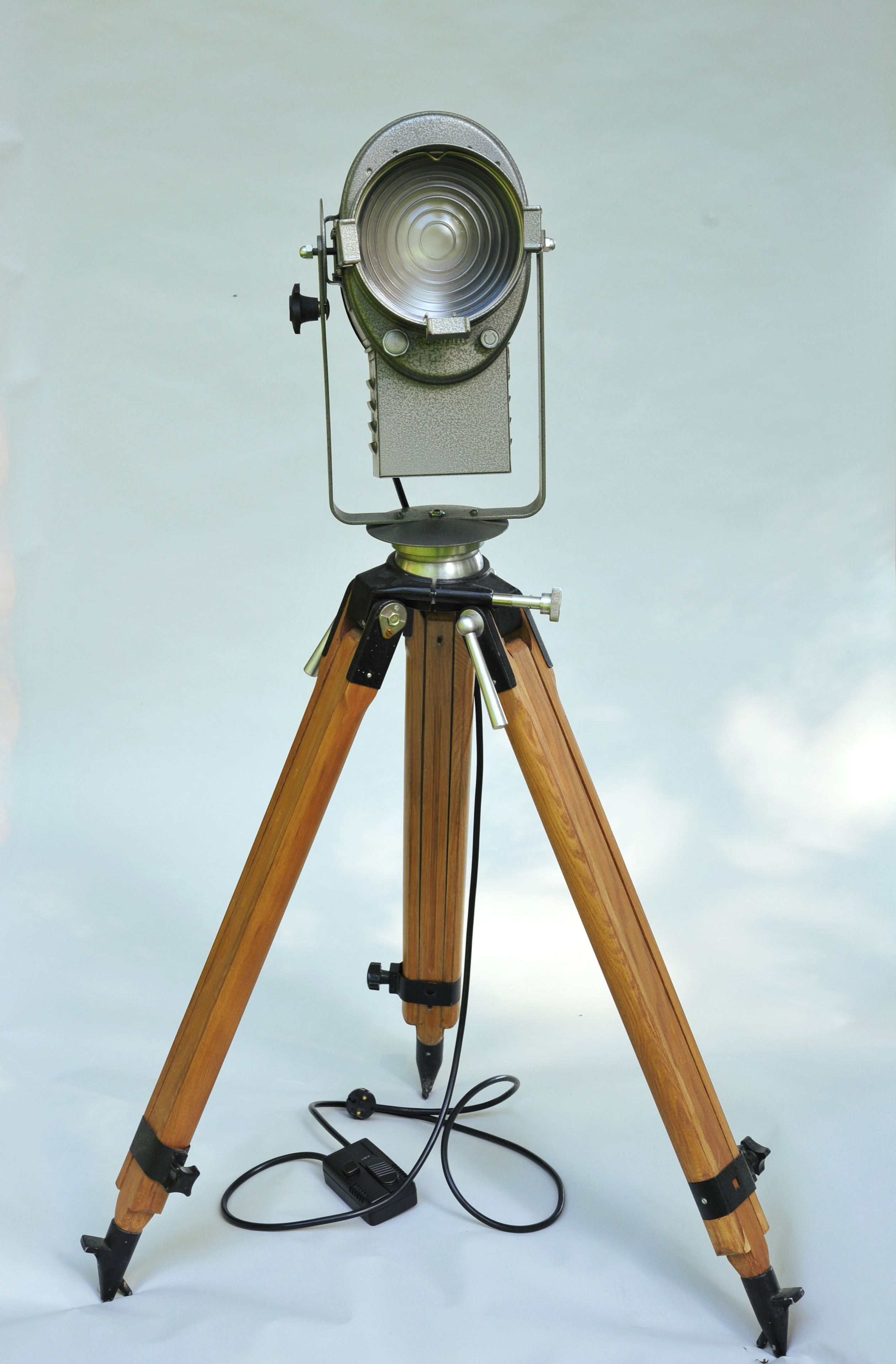 Cremer cinema projector on wooden tripod