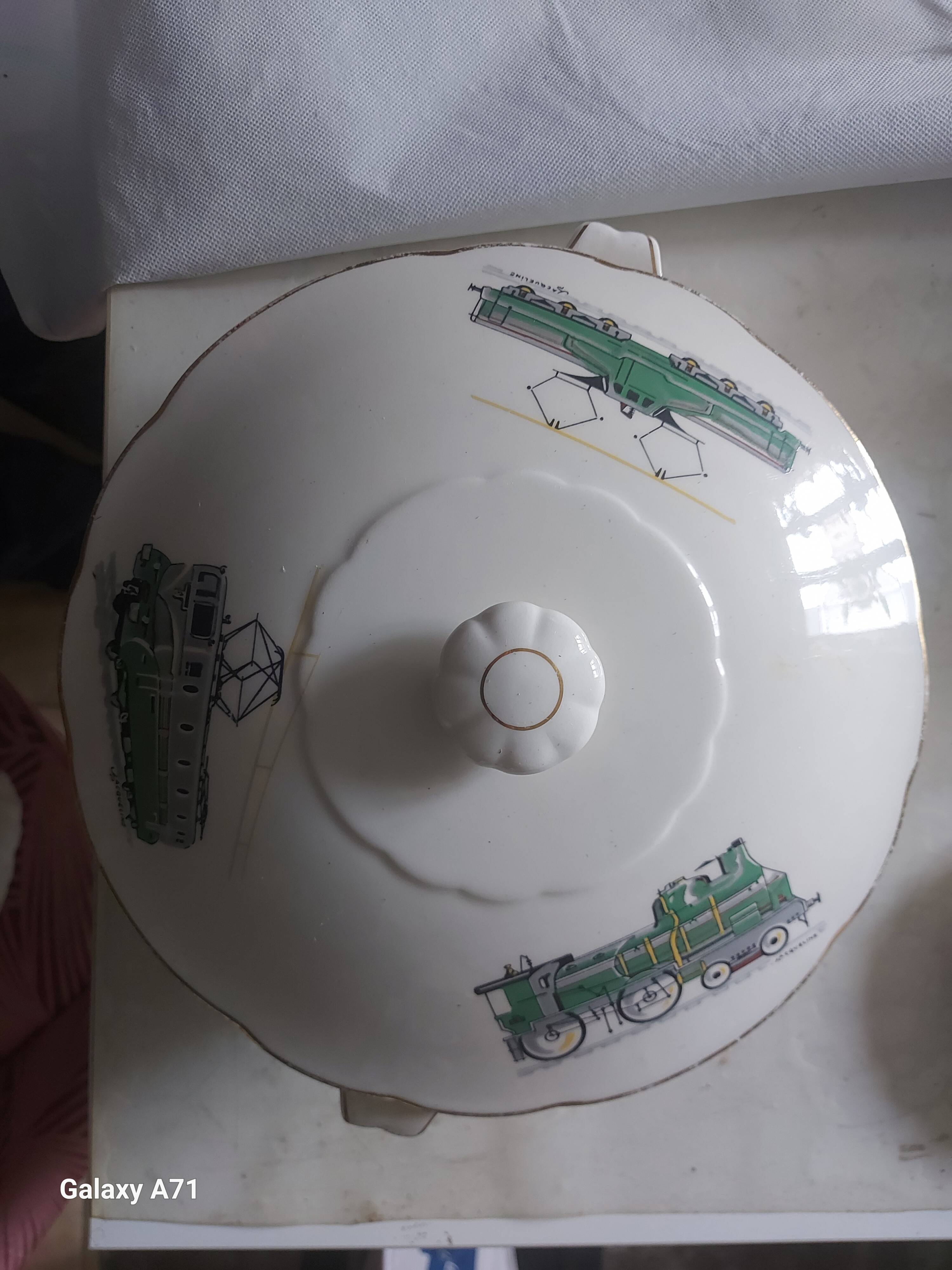 Service plate from Gien with a railway decoration.