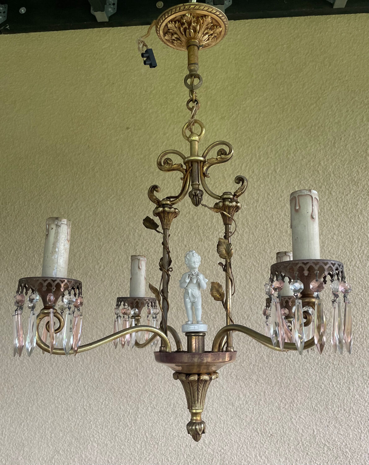 Antique bronze chandelier with porcelain angel.
