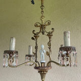 Antique bronze chandelier with porcelain angel.