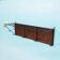 Vintage coat rack in teak and black metal, mid-century style.