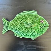 Fish dish in green earthenware