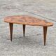 Vintage art deco coffee table with geometric marquetry