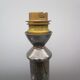 Old lamp base in silvered bronze, column shape