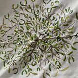 Hand-embroidered tablecloth on rectangular thread canvas