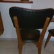 5 chairs in wood and black faux leather, Scandinavian style