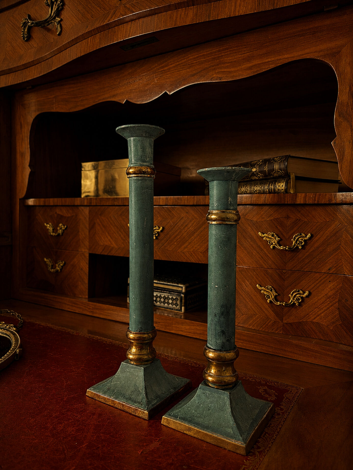 Exceptional pair of large candlesticks in patinated greenish-blue brass.