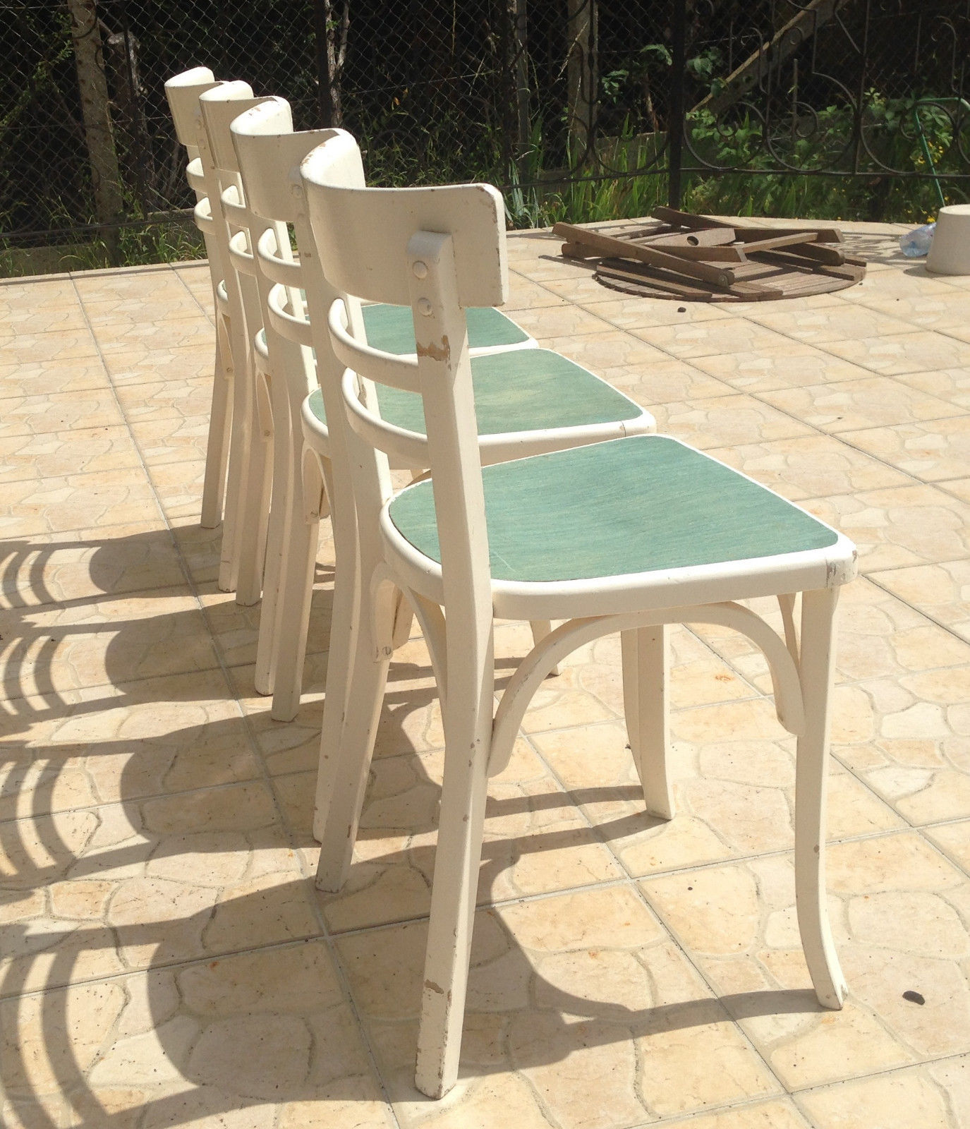 Ensemble de 4 chaises bistrot anciennes des années 50