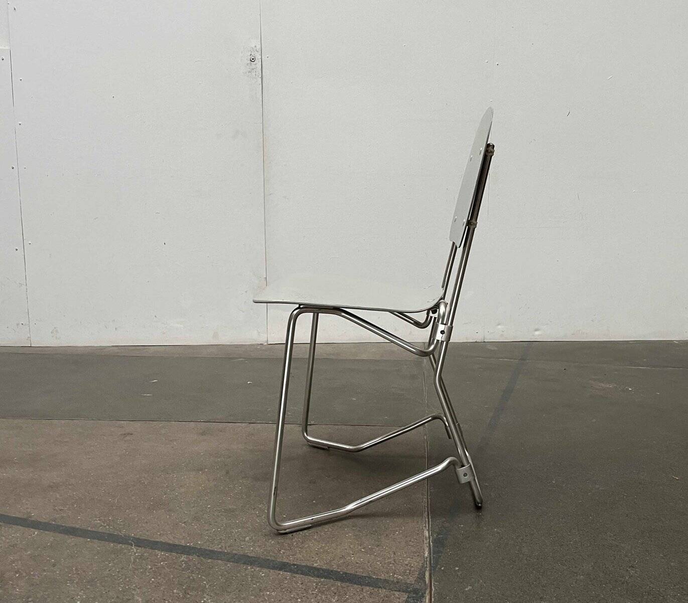 Stackable folding chair in space age style from the mid-century by Armin Wirth for Aluflex, 1960s, set of 3.