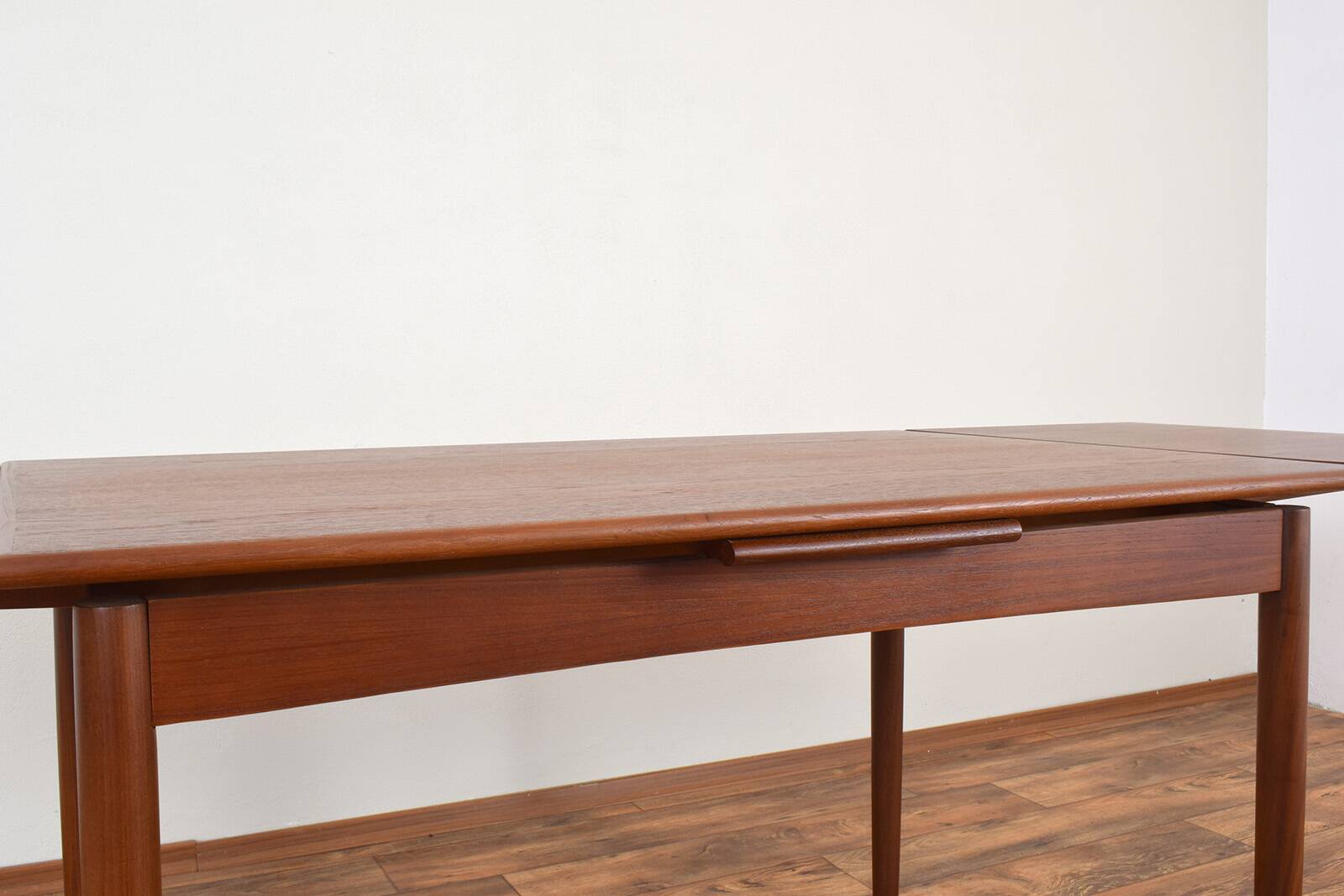 Mid-century Danish teak extendable dining table, 1960s.