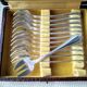 Set of 12 silver-plated oyster forks "Crossed Ribbons"