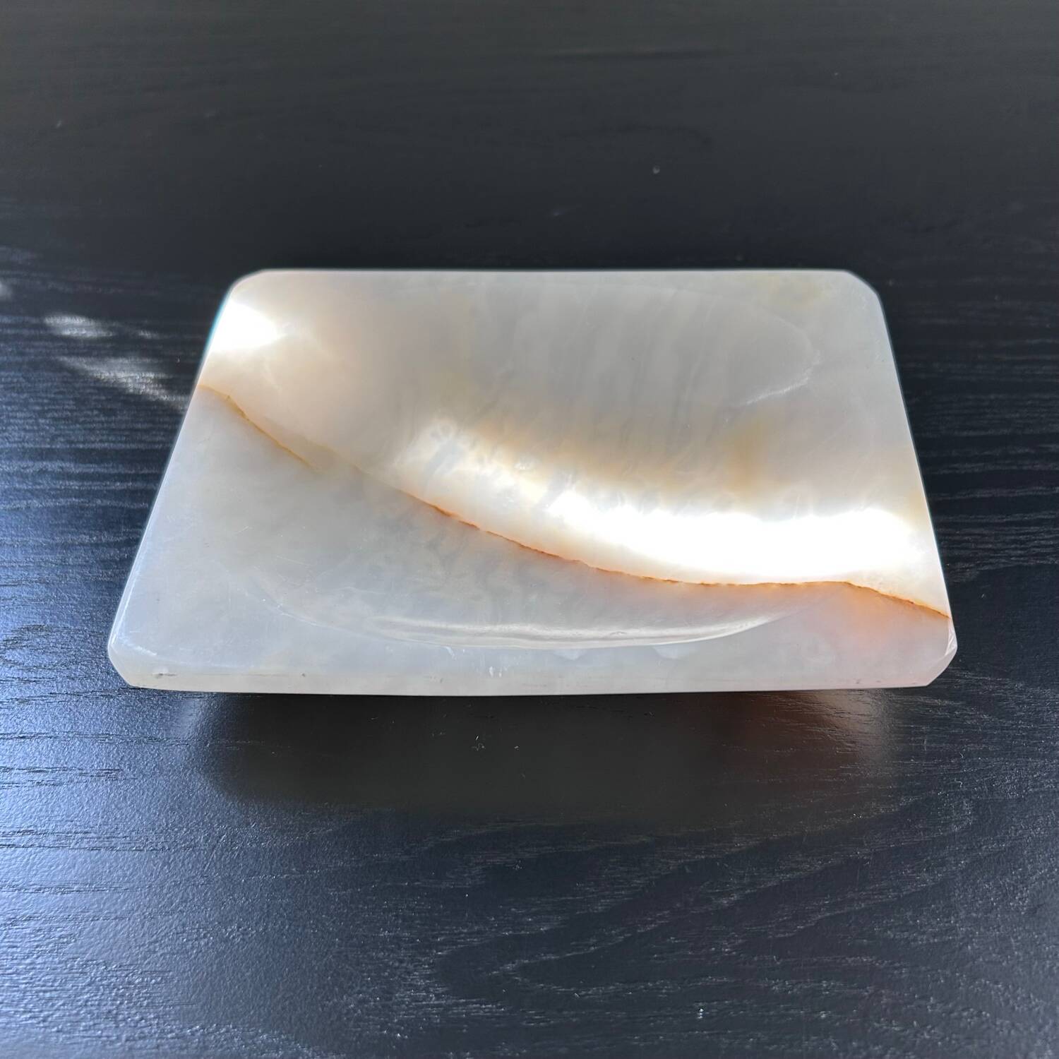 White onyx pocket emptier