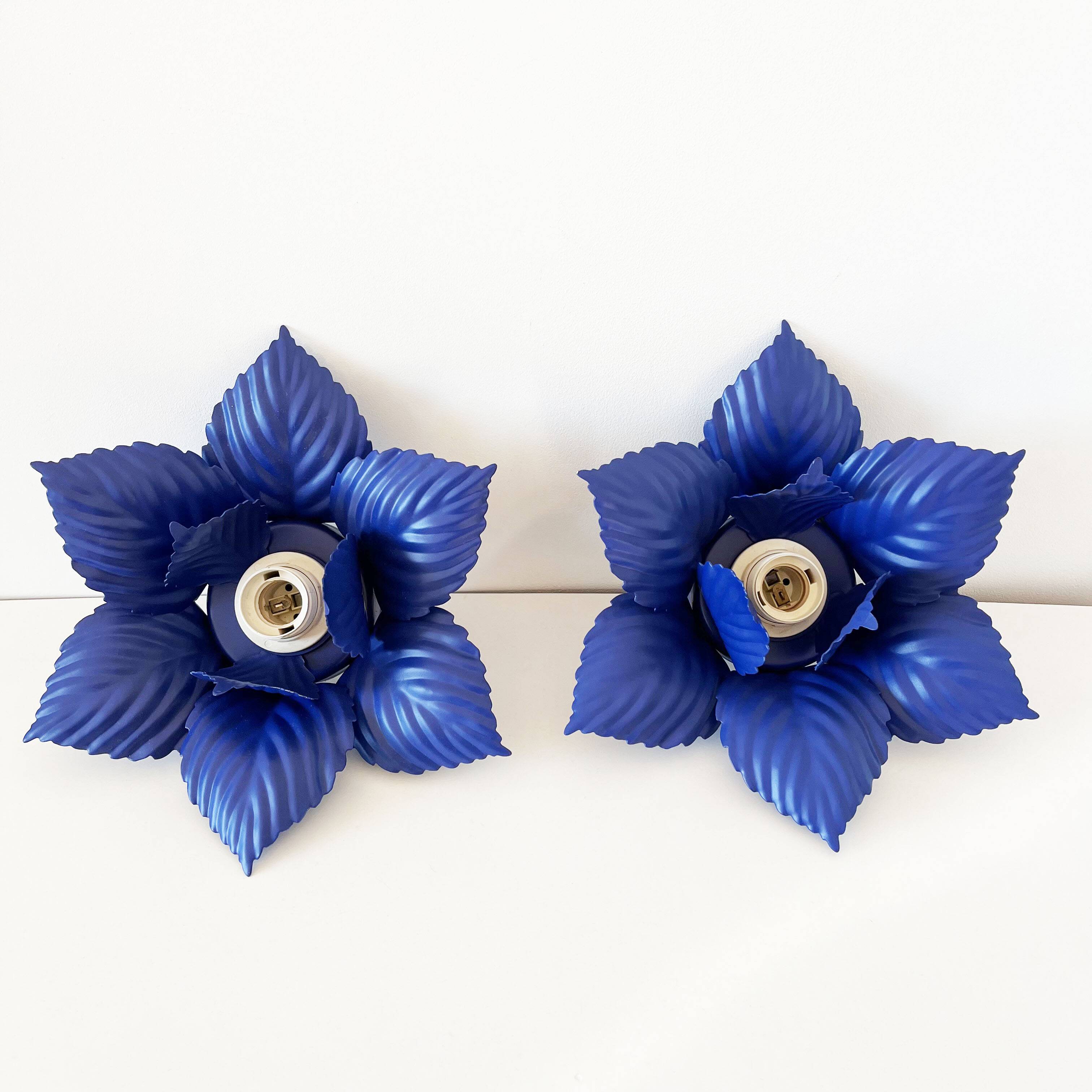 Pair of vintage Masca blue metal flower wall lights