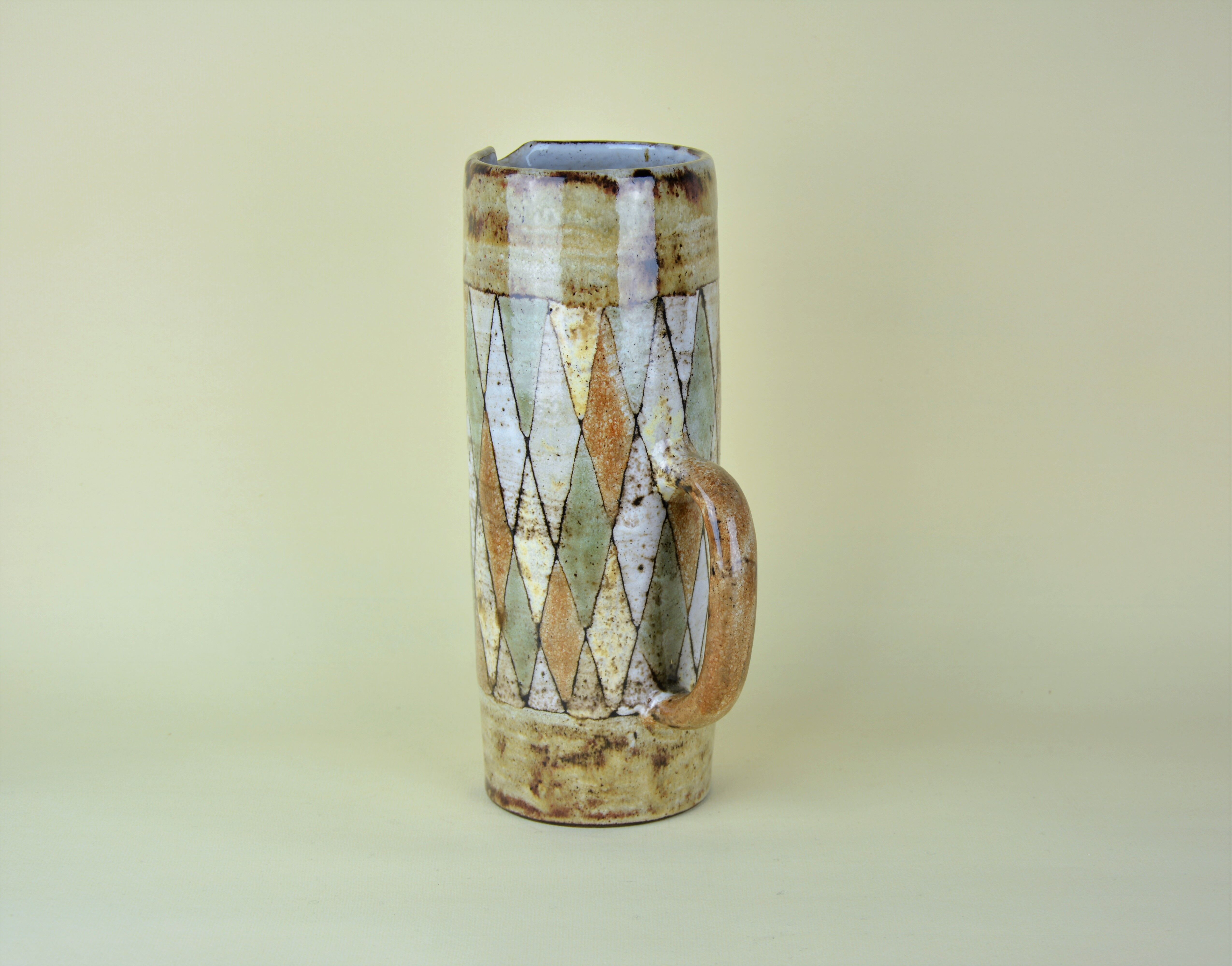 Pitcher and glasses with harlequin decoration, Atelier du Vieux Moulin