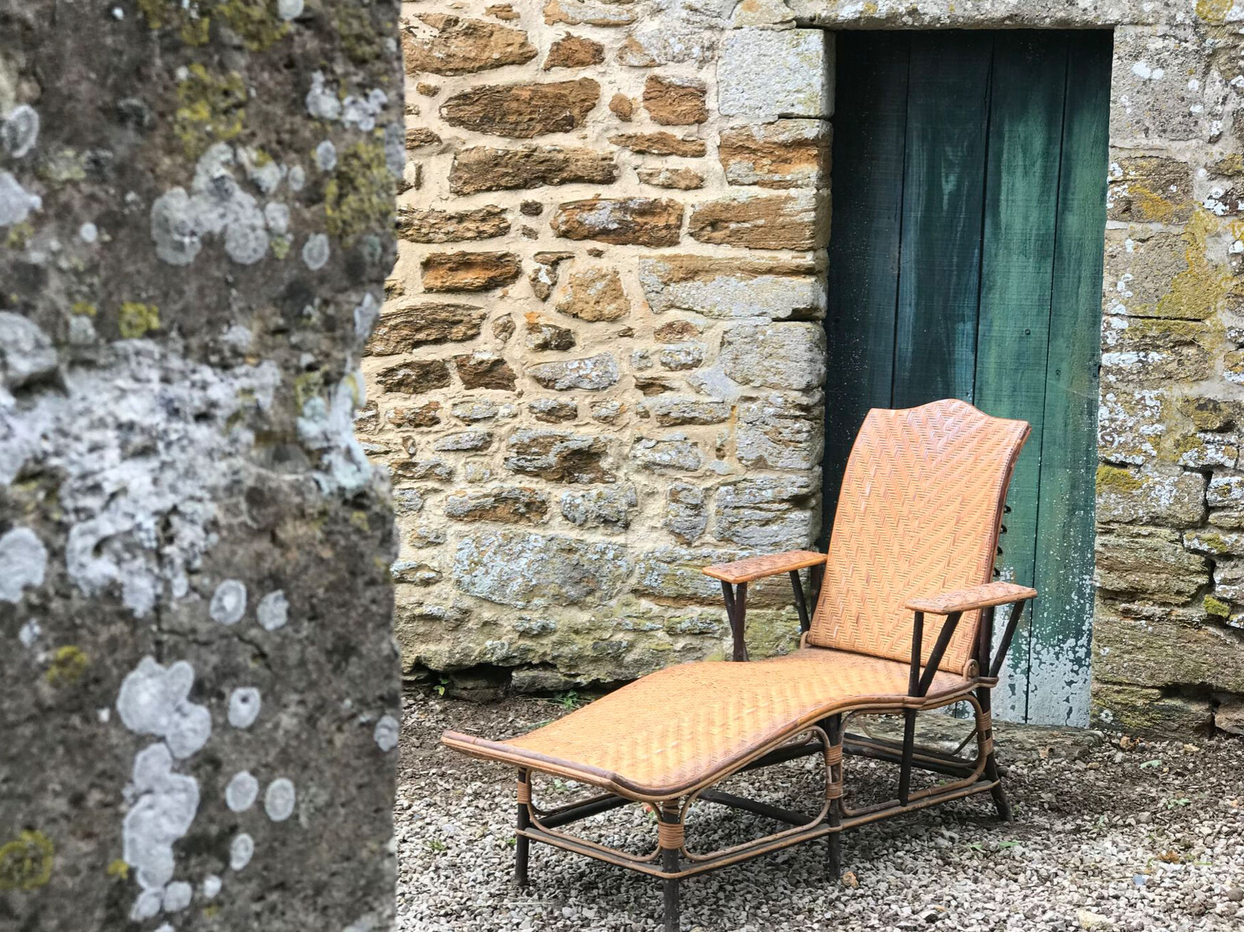 Old rattan lounger.