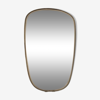 Asymmetrical free-form mirror from the 60s