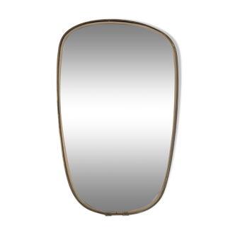 Asymmetrical free-form mirror from the 60s