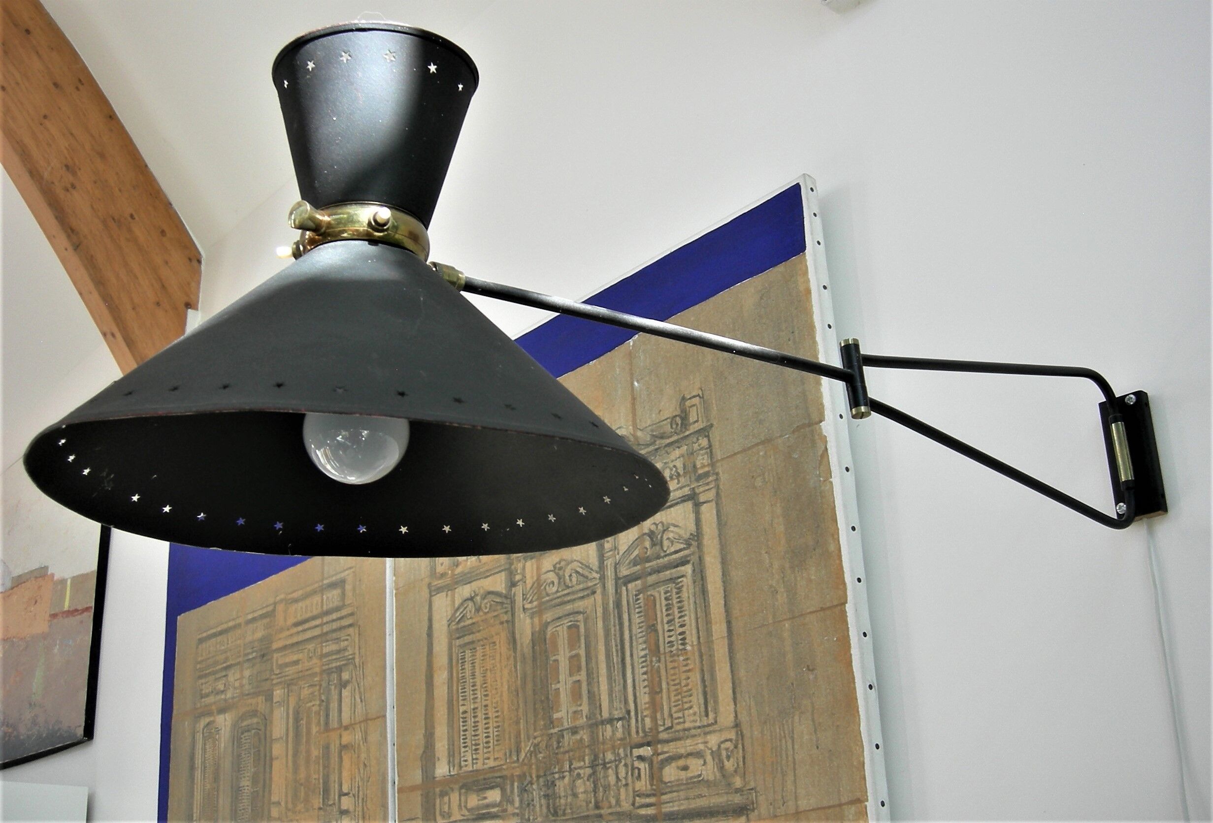 Roger Mathieu's diabolo sconce for Lunel with double lighting