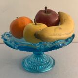 Fruit cup on blue-bubbled glass peder