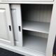 Wooden row with sliding doors