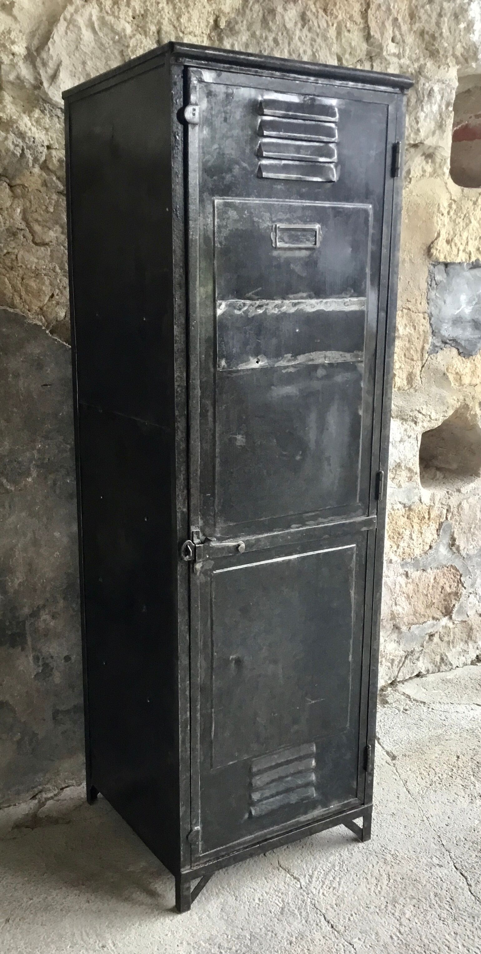 Riveted cloakroom converted into storage cabinet - early twentieth century