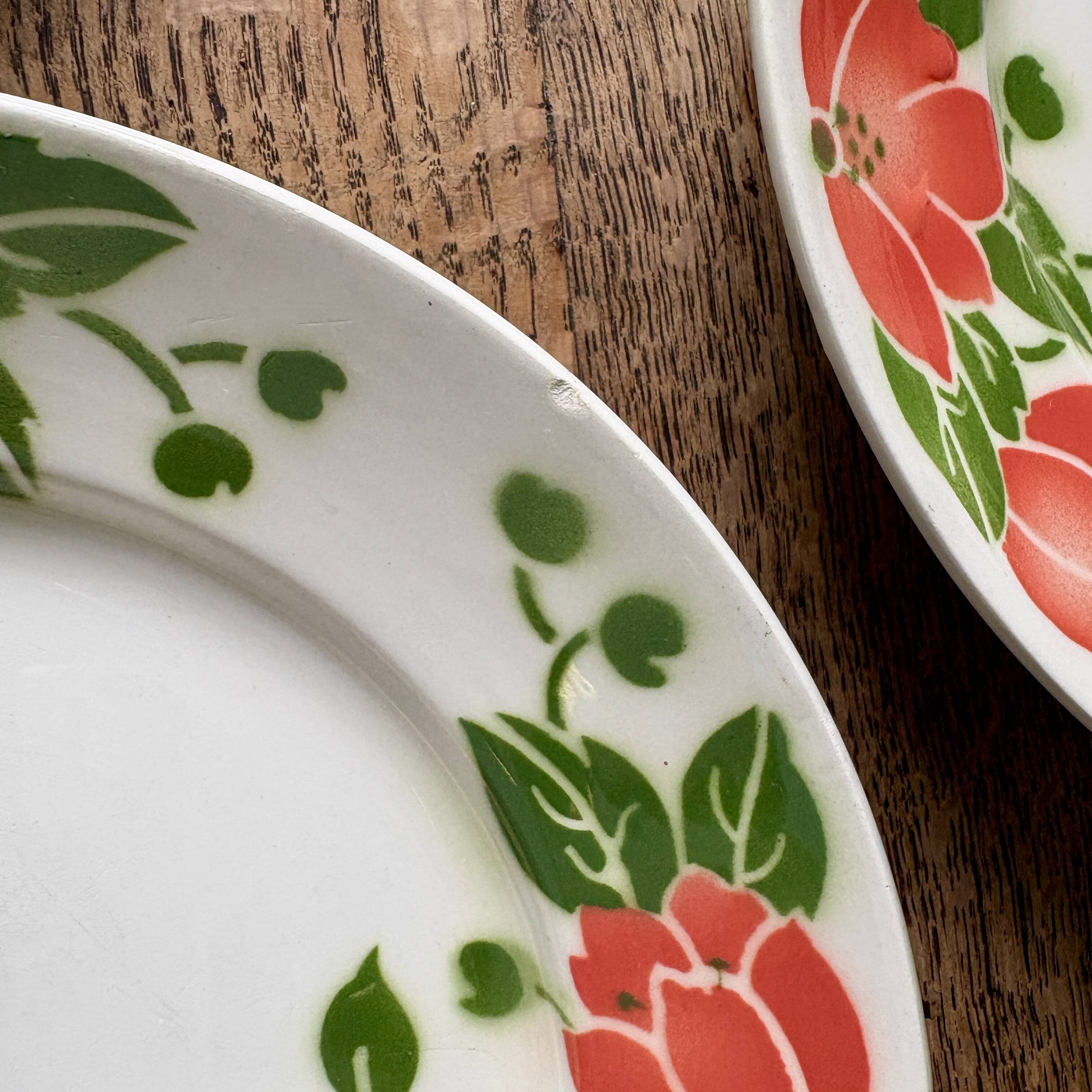 Set of 11 vintage flat plates by Eric de Moulin des Loups.