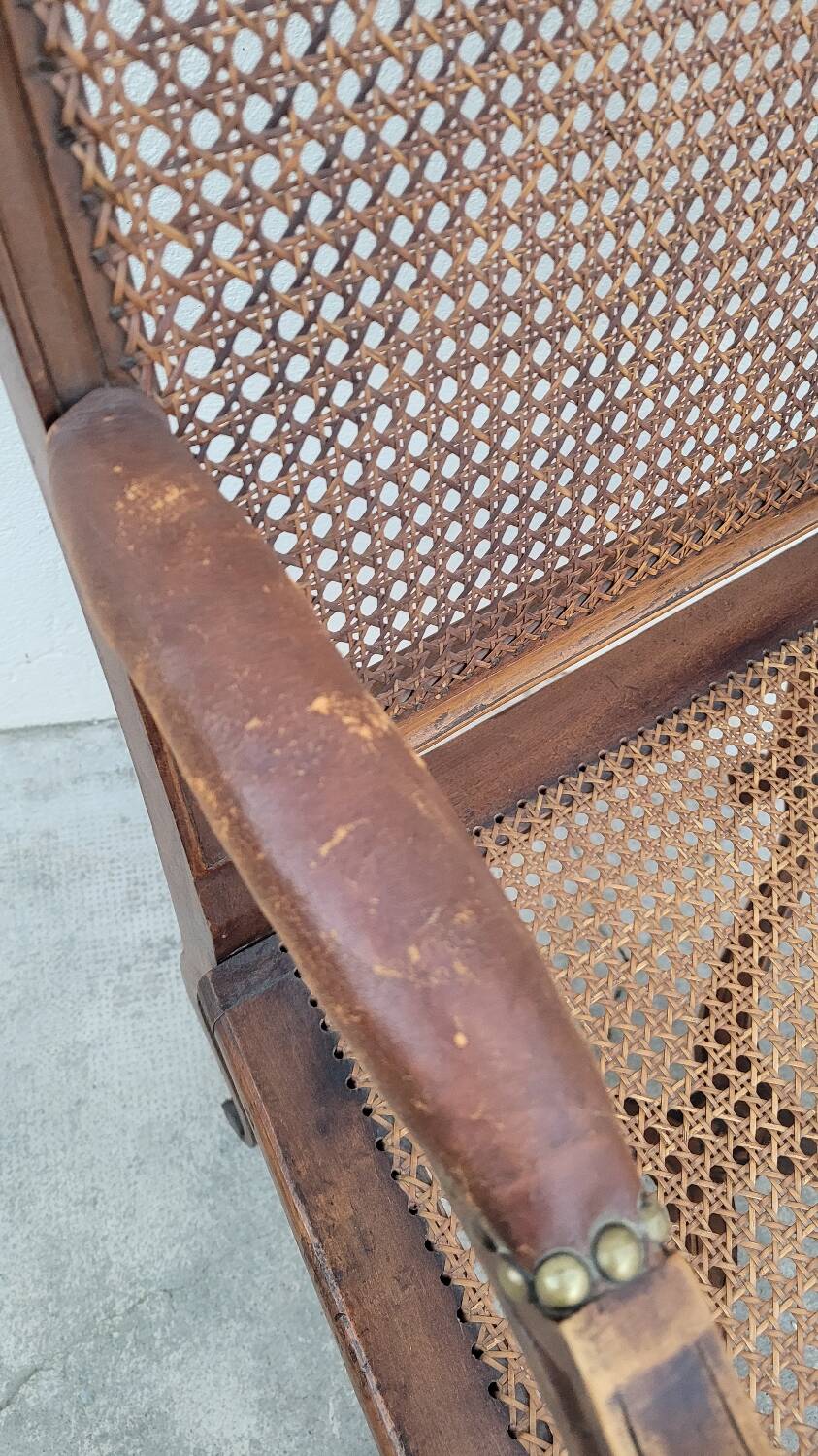 Louis XV Regency cane armchair leather armrests decorated with shell