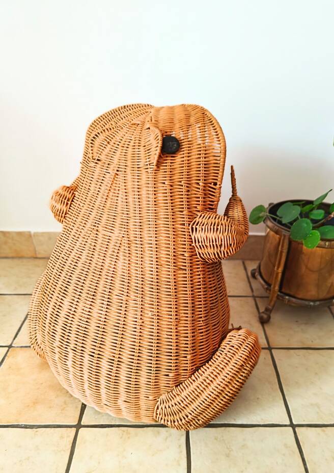 Vintage frog magazine rack in woven wicker design by Olivier Cajan