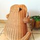 Vintage frog magazine rack in woven wicker design by Olivier Cajan