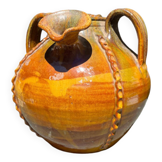Old glazed terracotta oil jar