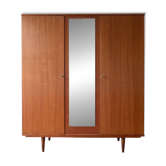 Vintage 1950s wooden wardrobe with mirror.