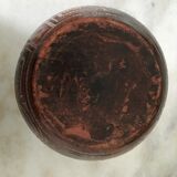 Vase in earth baked ethnic graphic patterns