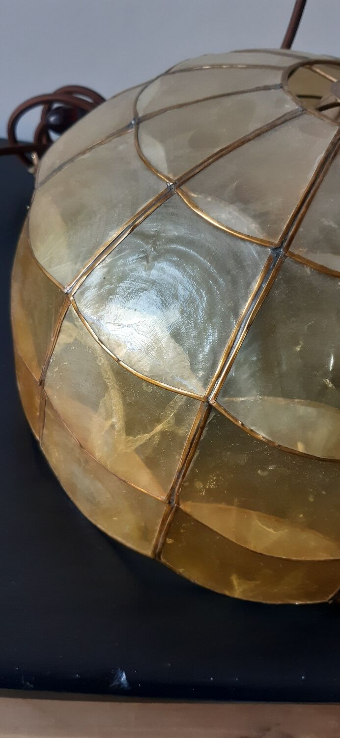 Mother-of-pearl and brass suspension