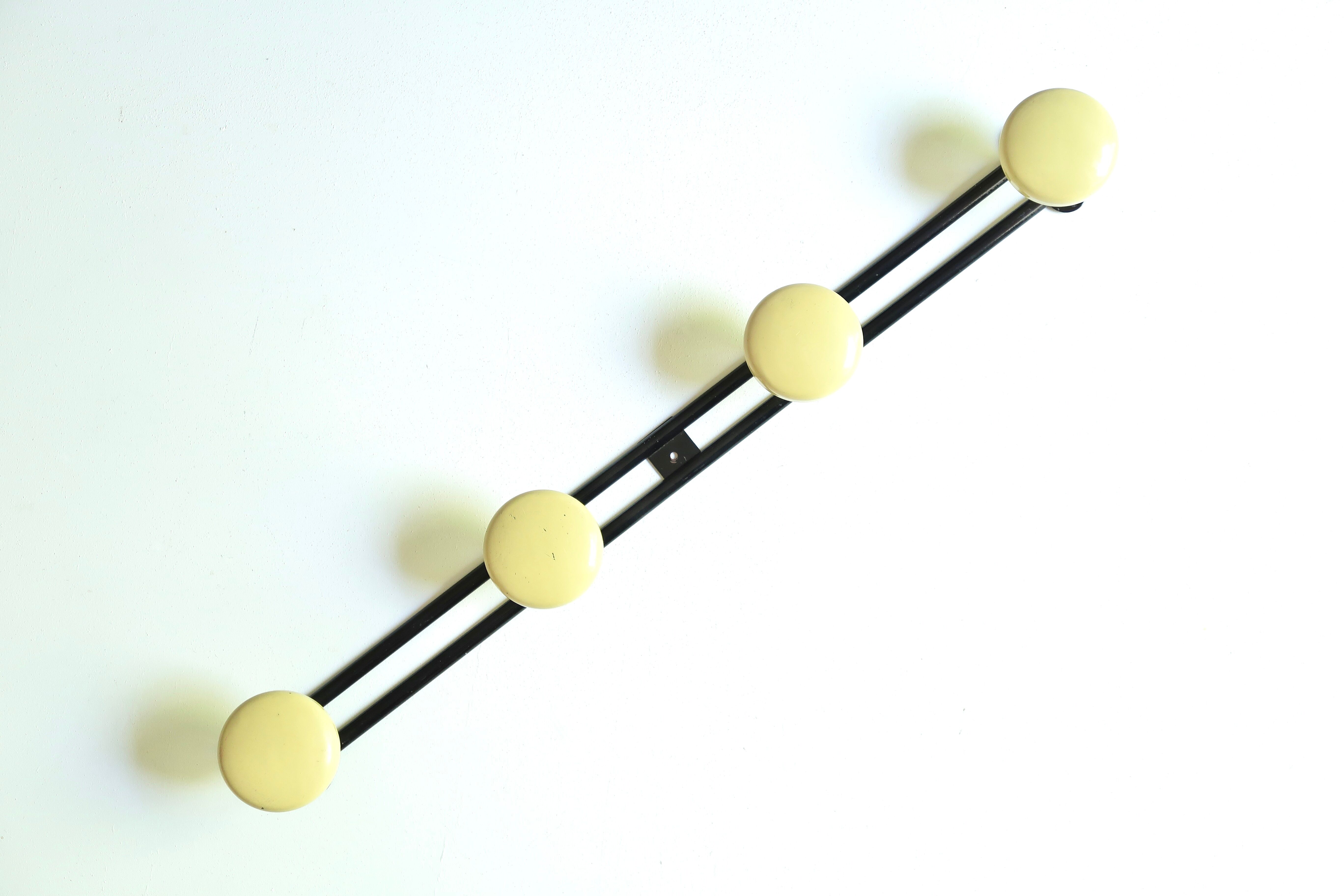Black and yellow metal coat rack, 50s