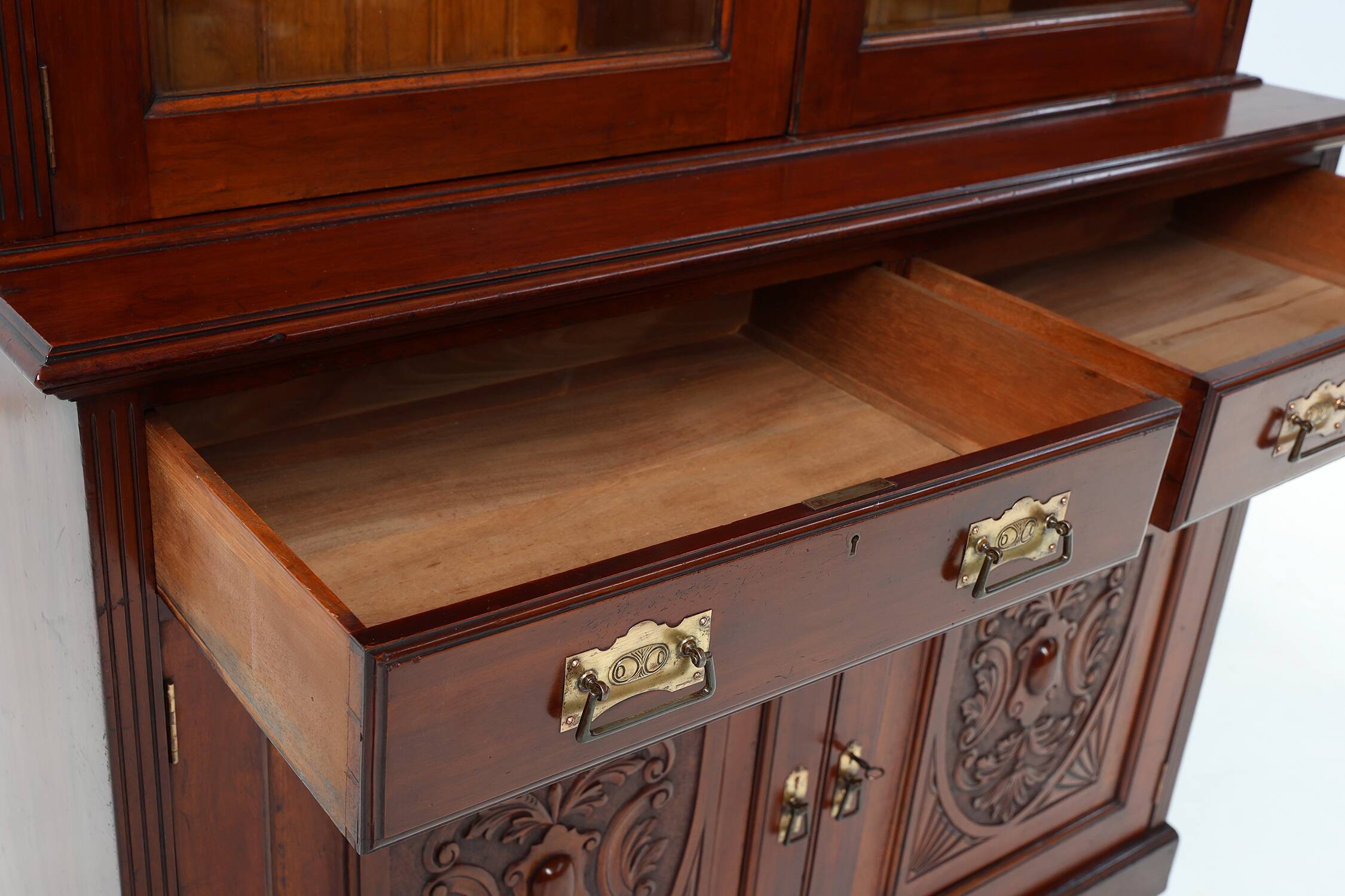 Art Nouveau Display Cabinet or Bookcase in oak with carvings and glass door