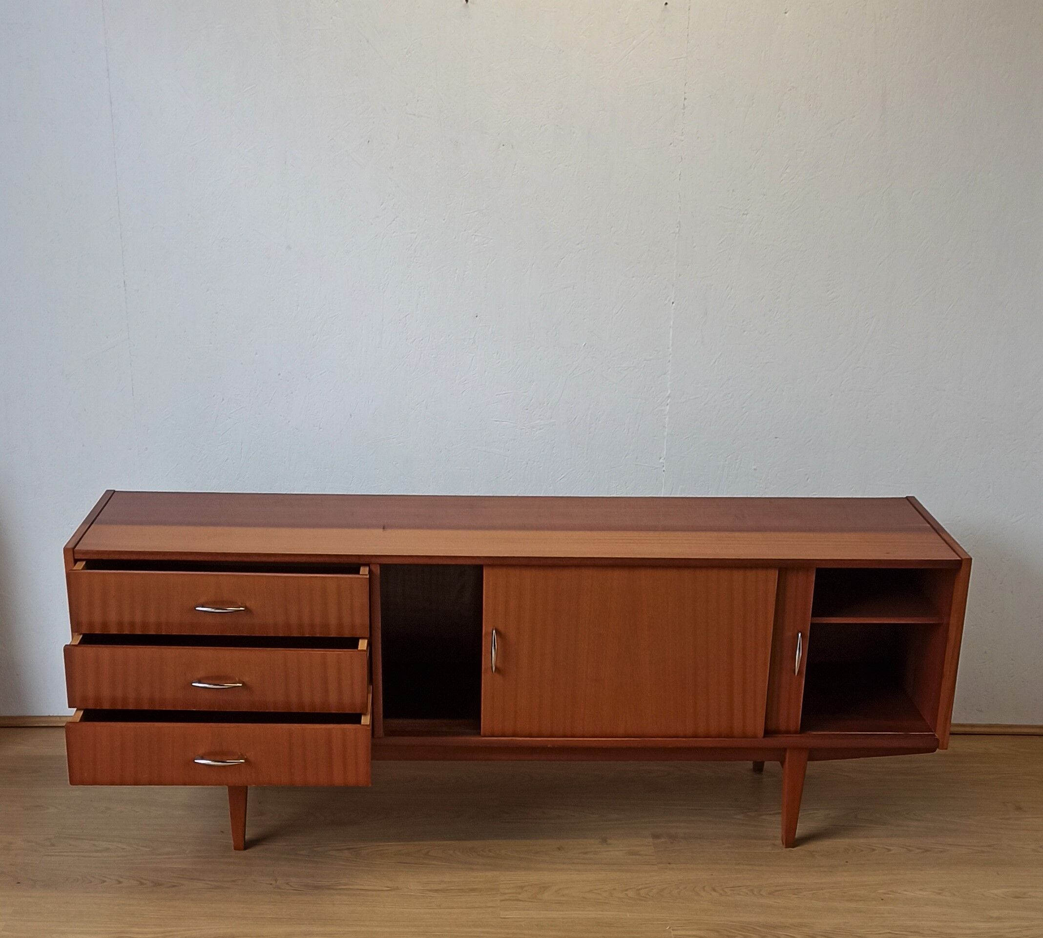 Modernist long sideboard of the 1970s.