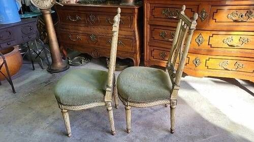 Pair of Louis XVI style chairs from the 18th century with lyre back.