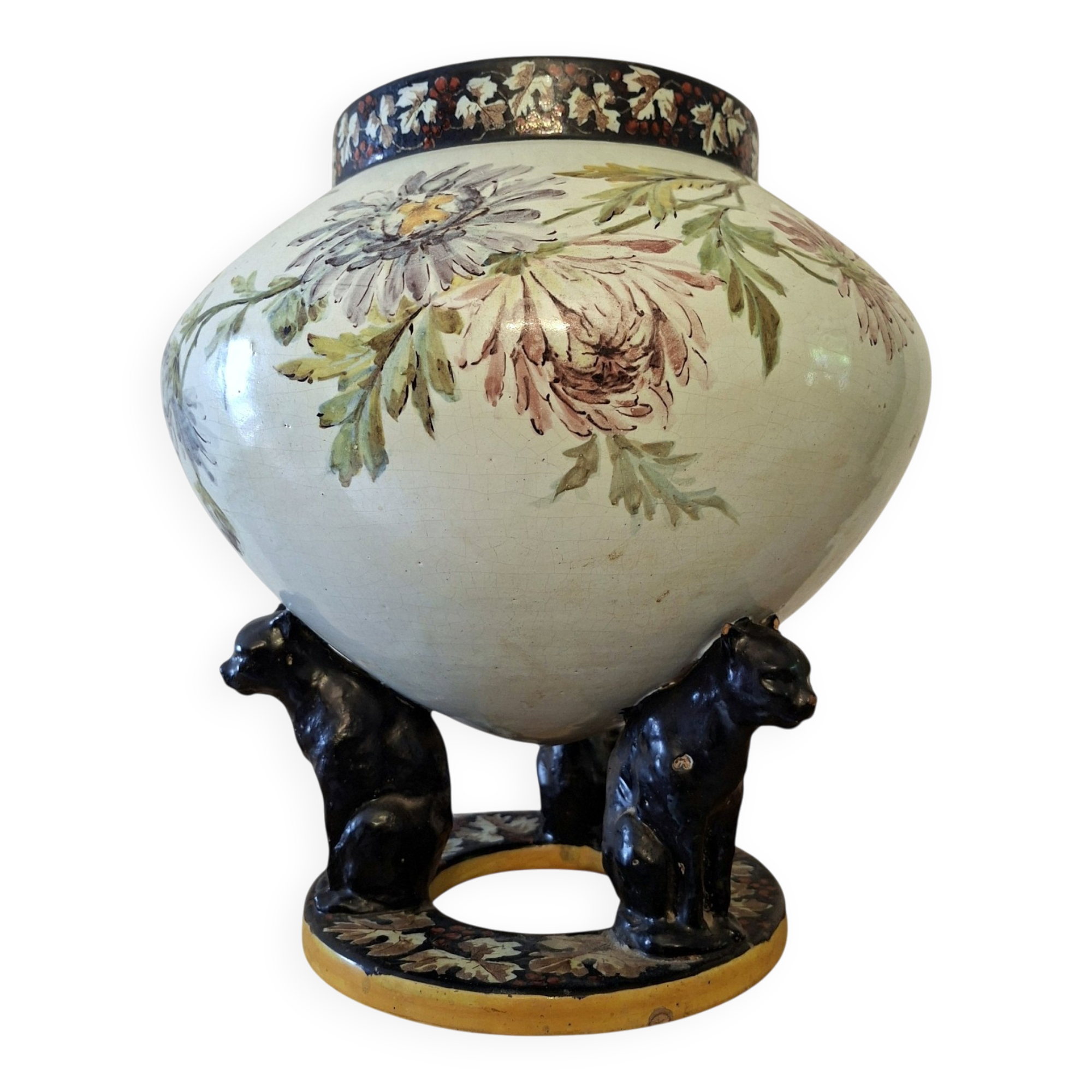 Large polychrome ceramic cache-pot with floral decoration.