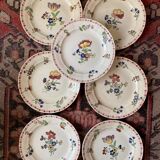 7 hand-painted flowered dinner plates.