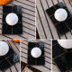 Black zellige wall light