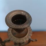 Bronze candlestick with lion head decoration