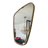 Asymmetrical mirror from the 60s freeform