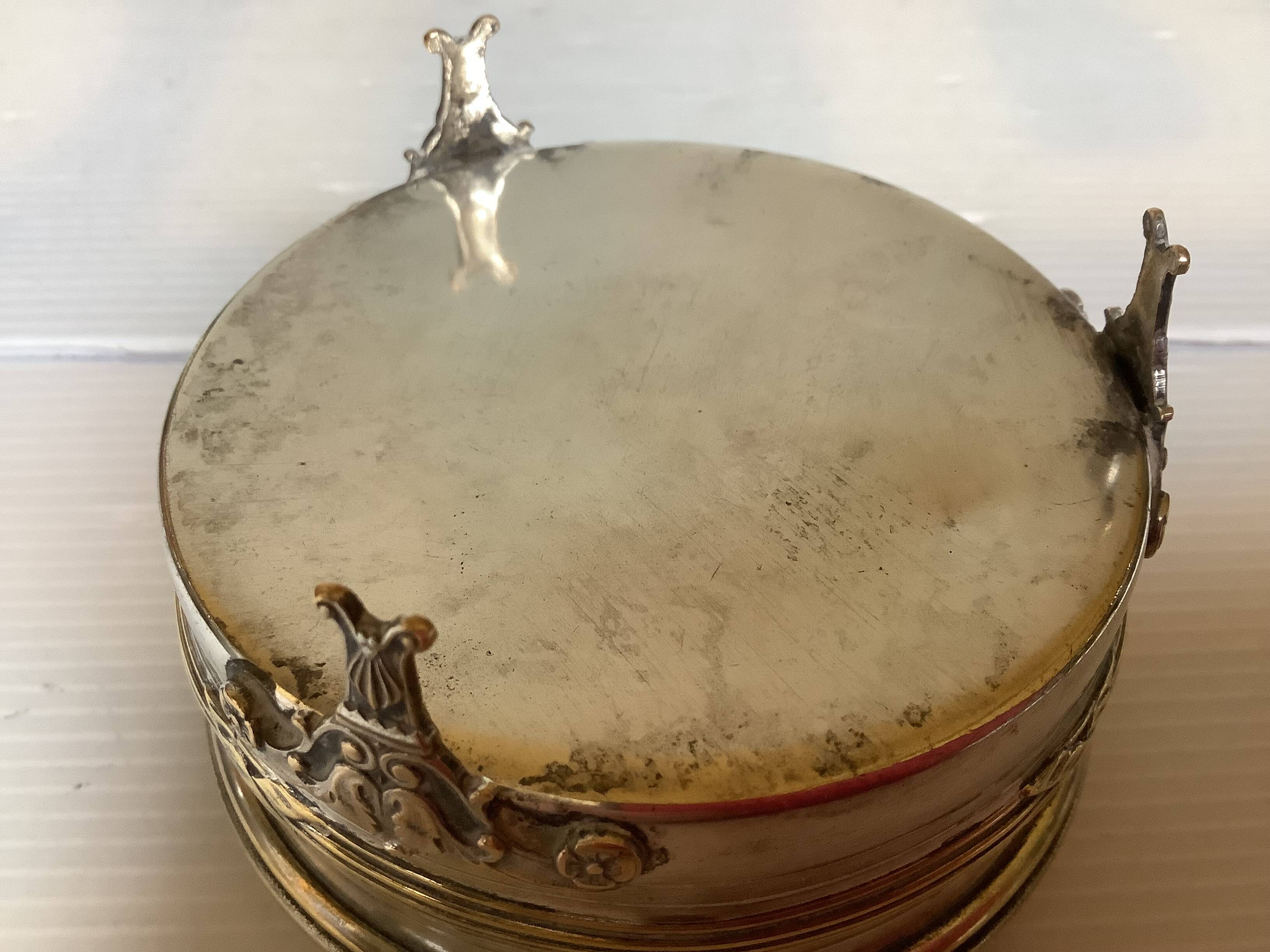 Antique silver-plated tripod box in the Louis XVI style.