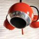 Suspended eyeballs, space age, bright orange, vintage, 70s
