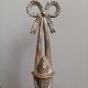 Patinated bronze wall lamp in louis XVI ribbon style