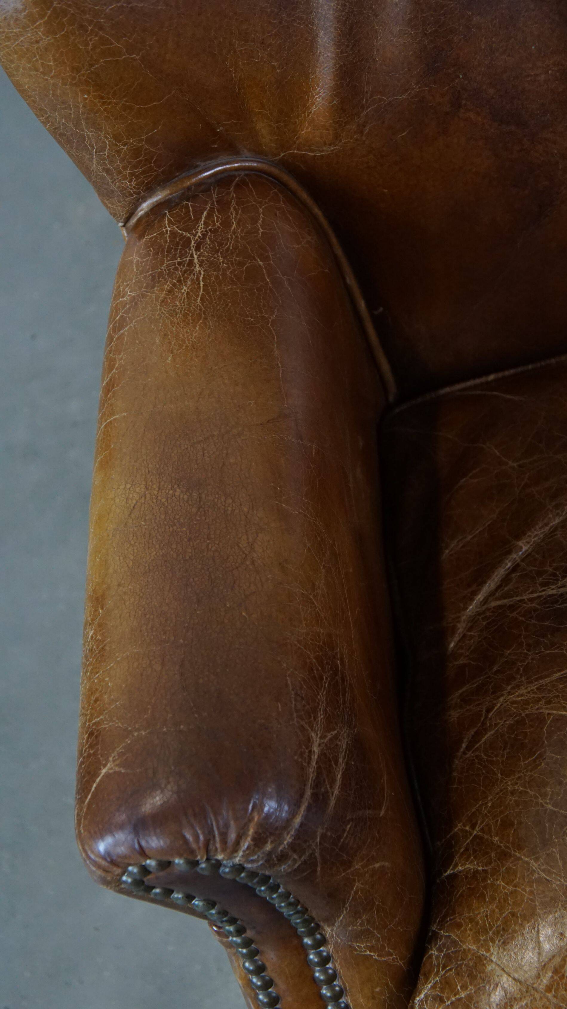 Cognac-colored subtle armchair