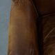 Cognac-colored subtle armchair
