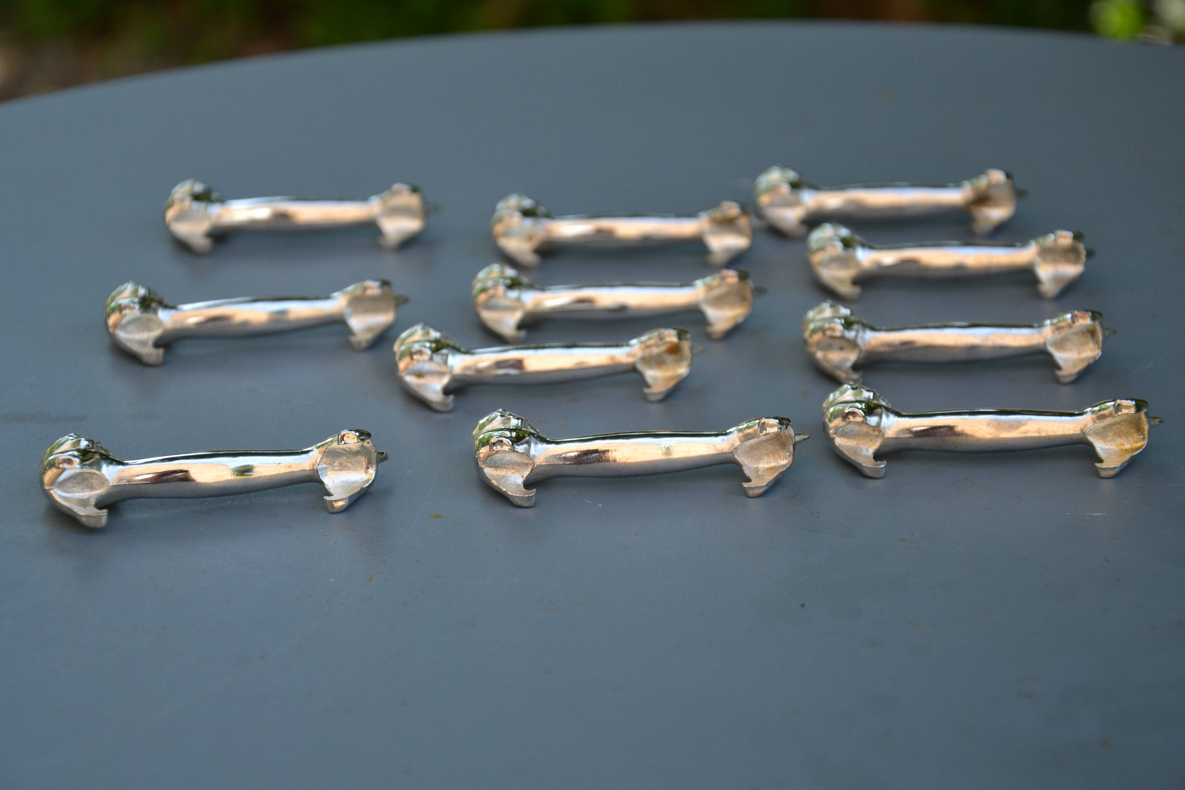 12 silver-plated cat knife rests