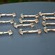12 silver-plated cat knife rests