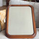 Vintage wooden framed mirror with bevelled glass.